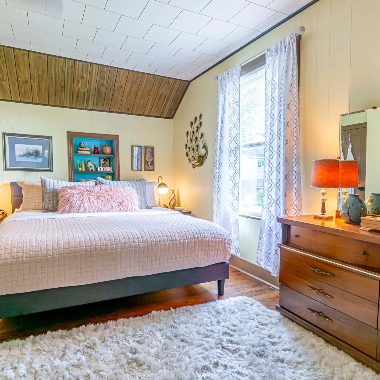 bedroom with pink king bed