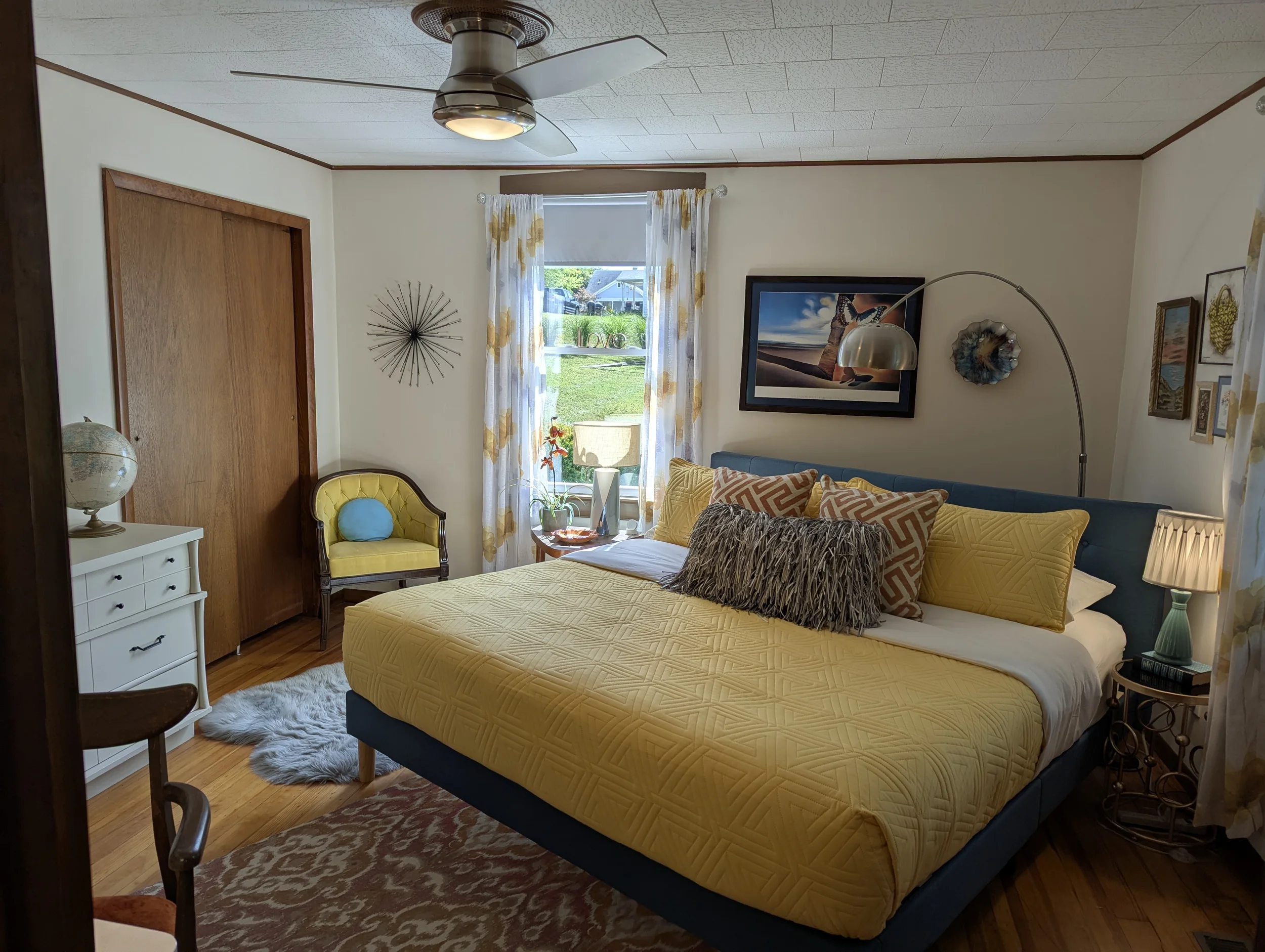 bedroom with yellow king bed